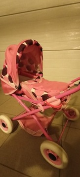 Bardzo ładny różowy wózek dla lalki z nosidełkiem