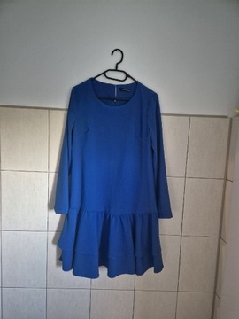 Niebieska sukienka z długim rękawem I falbanką Reserved S 36