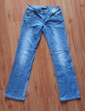 Damskie spodnie jeans jasnoniebieskie r29 Dromedar