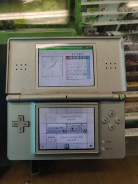 Konsola Nintendo ds lite srebrna. Czytaj opis.