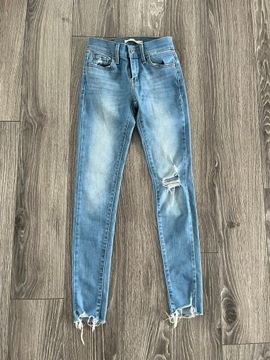 Spodnie Levis 710 Super Skinny z dziurami 24/30