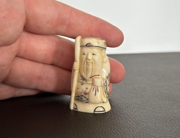 Netsuke - Wędrowiec - Japonia XX w. 