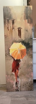 duży, nowoczesny obraz kobiety pod parasolem
