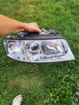 Lampa maska błotnik zderzak Audi a6 c5