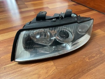 Lampa reflektor LEWA Audi A4 B6 IDEALNA
