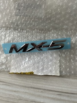 Emblemat tylny zderzak Mazda MX-5 NA1P51721