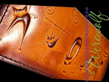 Pomarańczowy skórzany portfel z kotami