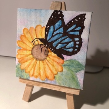 Obraz motyl i słonecznik