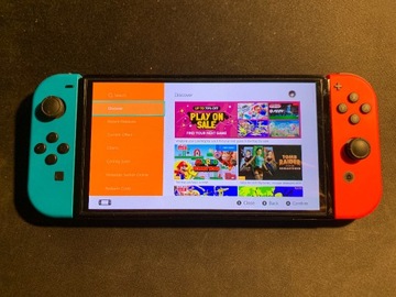 Nintendo Switch OLED + 2 gry + akcesoria