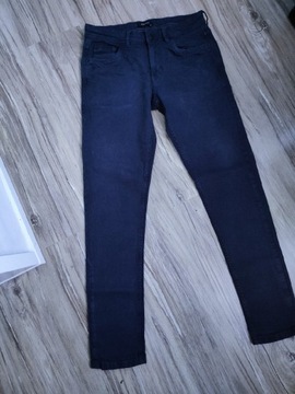 Męskie spodnie Reserved jeansy S