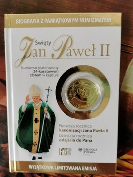 numizmat św Jan Paweł II i książka