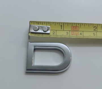 Emblemat, znaczek na tylną klapę auta litera D