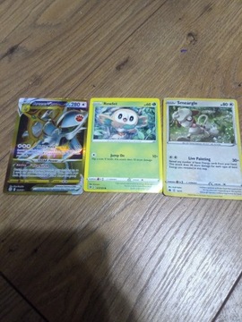 Trzy karty pokèmon arceus V Star ,Rowlet, Smeargle