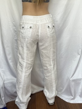 Białe spodnie lniane z kieszeniami szeroka nogawka