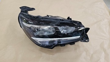 REFLEKTOR PRAWY CORSA F GM 9829465380