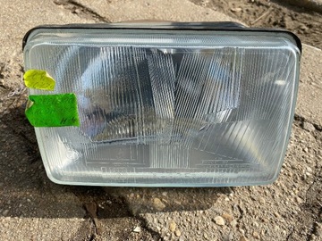 Reflektor przedni lampa Skoda 105 prawy nowy 