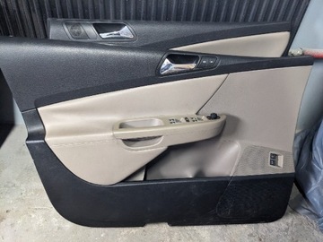 VW Passat B6 tapicerka drzwi mocca brązowa 