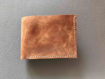 Męski portfel kieszonkowy ze skóry w kolorze brązo