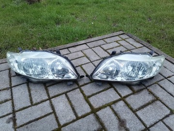 Reflektory Corolla E15 X lampy kpl oryginalne