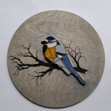 Obrazek ptak.  Mozaika na drewnie.