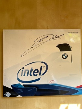 Album BMW Sauber z autografem Roberta Kubicy