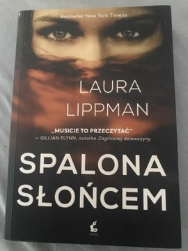 SPALONA SŁOŃCEM - LAURA LIPPMAN