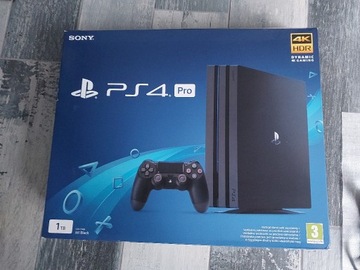 PS4 Pro 1TB Jet Black + pad + kamera + gry