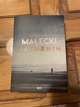 Jakub Małecki - Saturnin