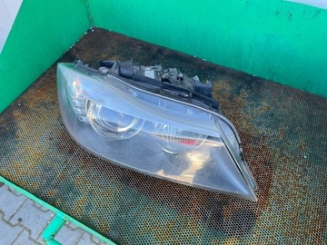 Bmw lampa reflektor E90 7240264 xenon skretny