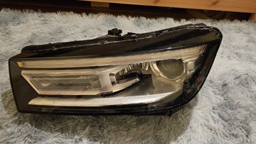 Lampa Lewa Audi Q5 80A '16+ uszkodzone zaczepy