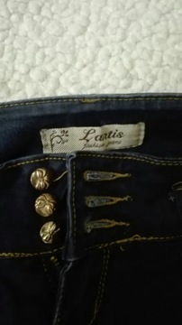 Spodnie jeansy niebieskie granatowe kokardki rurki