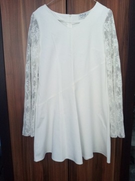 Biała sukienka trapezowa