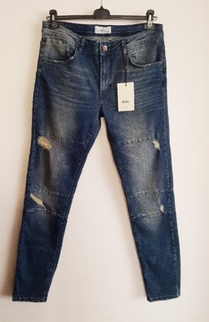 Spodnie, jeansy  REBEL,przetarcia rozm.36/34