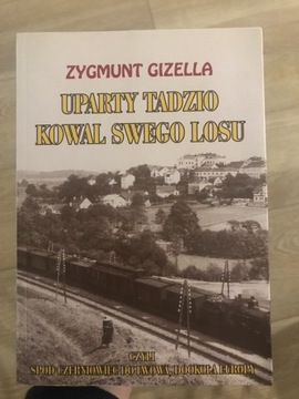 Uparty Tadzio kowal swego losu, Zygmunt Gizella