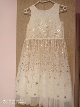 Piękna sukienka H&M r.140 jak nowa