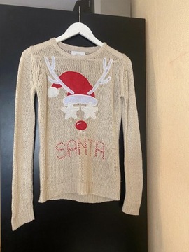 Beżowy świąteczny sweterek z reniferem