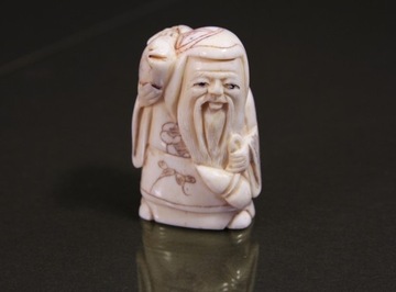 Netsuke - Mędrzec z ryba - Japonia XX w. 