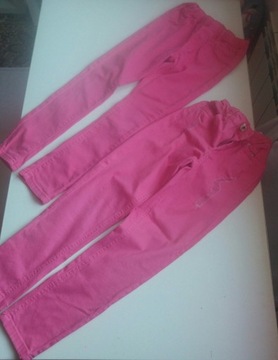 Różowe spodnie-rurki rozm.122-128 dwie pary