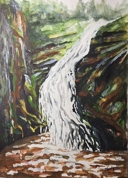 wodospad wśród skał i zieleni