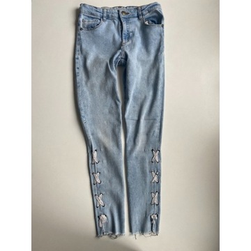 Jasne spodnie jeansowe 152 cm