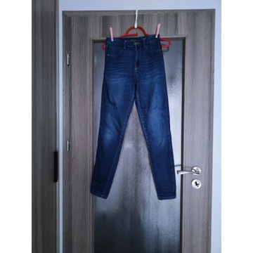Dziewczęce spodnie jeansy Reserved 158