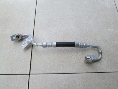 Ford оригінальний номер cn11-19n651-ab шланг кондиціонер фото №1