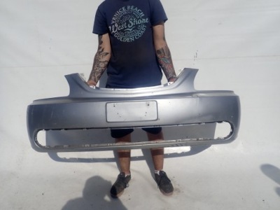 Kia carens i lift 02-06 бампер перед передній фото №1