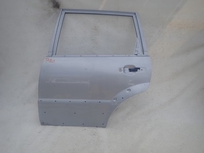 Ssangyong rexton 01-06 двері ліва задня задні фото №1
