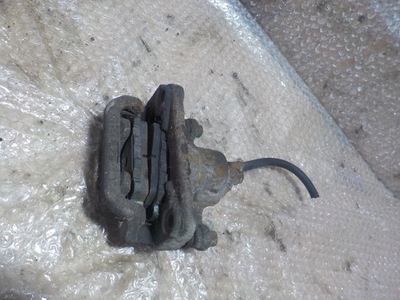 Супорт гальмівний opel movano b nissan nv400 задня правий лівий оригінал фото №1