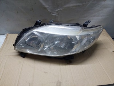 Toyota corolla sedan e15 2010-2014 фара лівий лампа перед передня фото №1