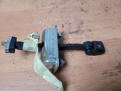 Обмежувач двері opel corsa e правий перед фото №1