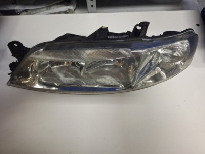 Фара лівий opel vectra b 99-03 ref 9119519 фото №1