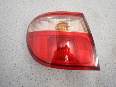 Nissan almera n16 sedan 4d 00-06 лампа задняя левая наружная фото №1