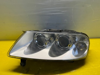 Лампа ліва передня ксенон volkswagen touareg eu 7l6941015bk фото №1